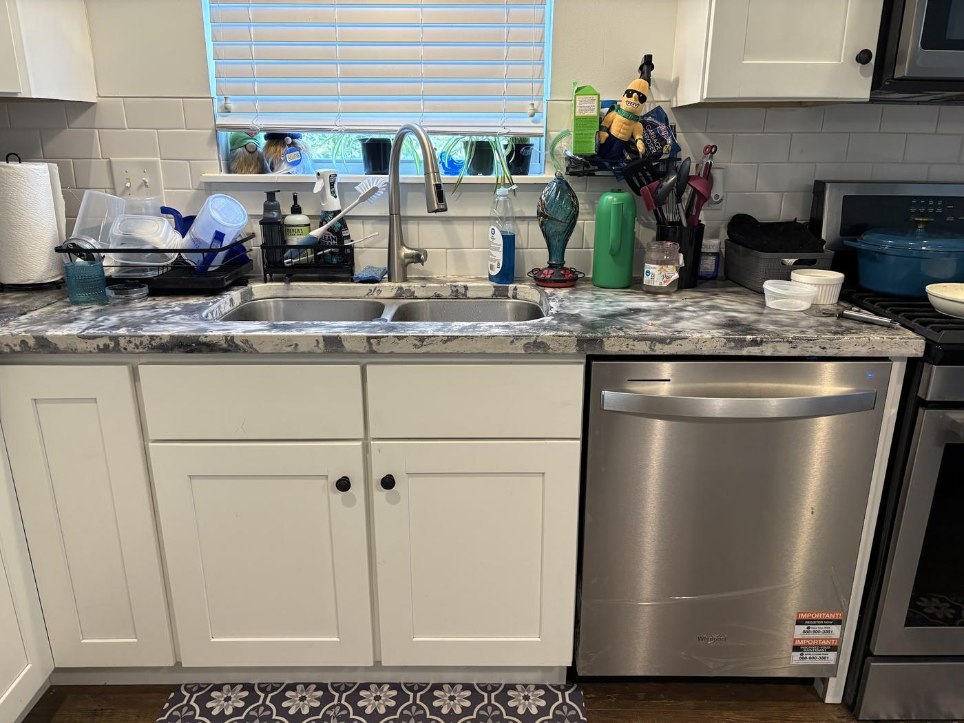The finished kitchen run, with the new faucet, sink and dishwasher in place